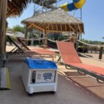 Amusement park cabana outfitted with LounGenie smart unit