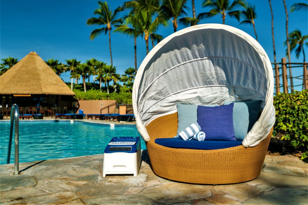 LounGenie hospitality amenity unit installed at Hilton Waikoloa Village resort cabana