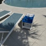 LounGenie safe and charging features inside pool cabana