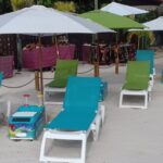 Pool cabana with LounGenie smart amenity unit — full view
