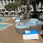 LounGenie cabana system with waterproof safe and charging