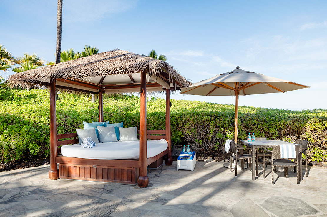 LounGenie amenity unit inside shaded resort poolside cabana