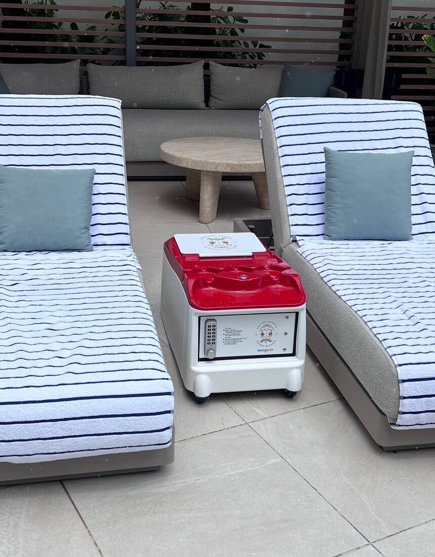 LounGenie commercial-grade amenity unit installed at resort poolside seating area