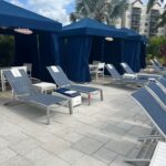 Upscale pool venue cabana equipped with LounGenie smart system