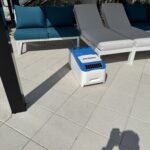 LounGenie unit with USB charging and ice bucket in cabana