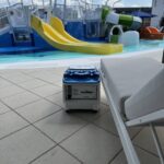 Aerial view of resort pool deck with LounGenie cabana installations