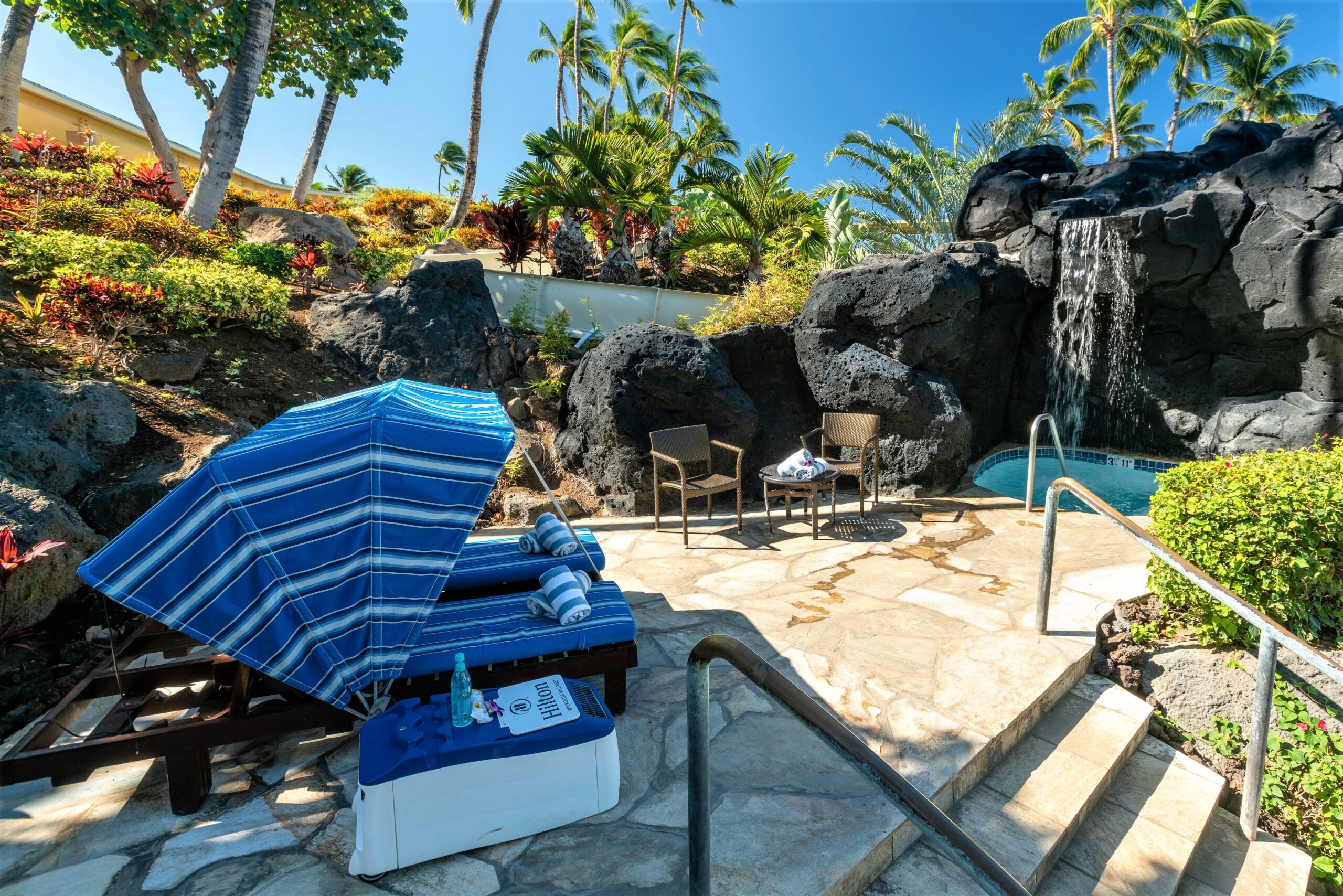 LounGenie ice bucket and waterproof safe inside resort cabana