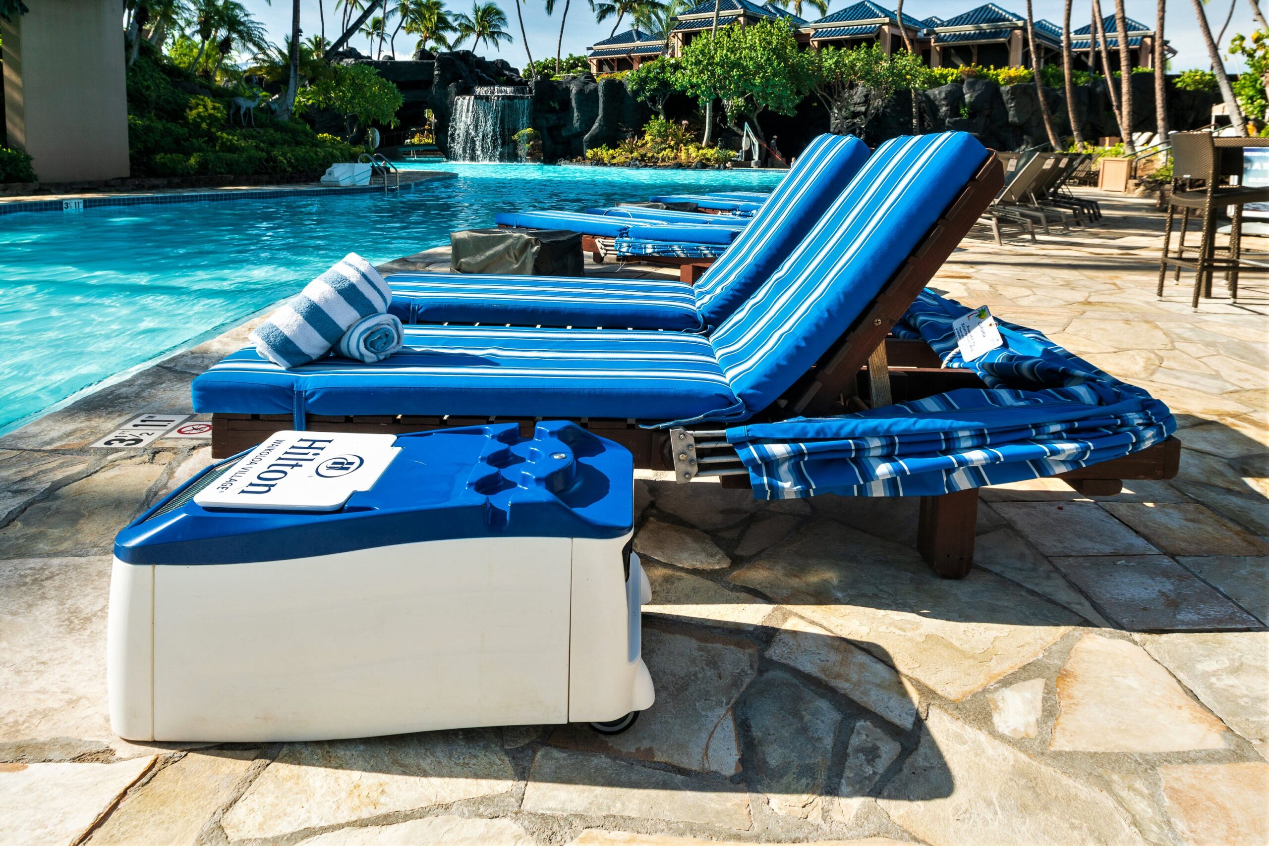 Hotel pool cabana outfitted with LounGenie smart amenity unit