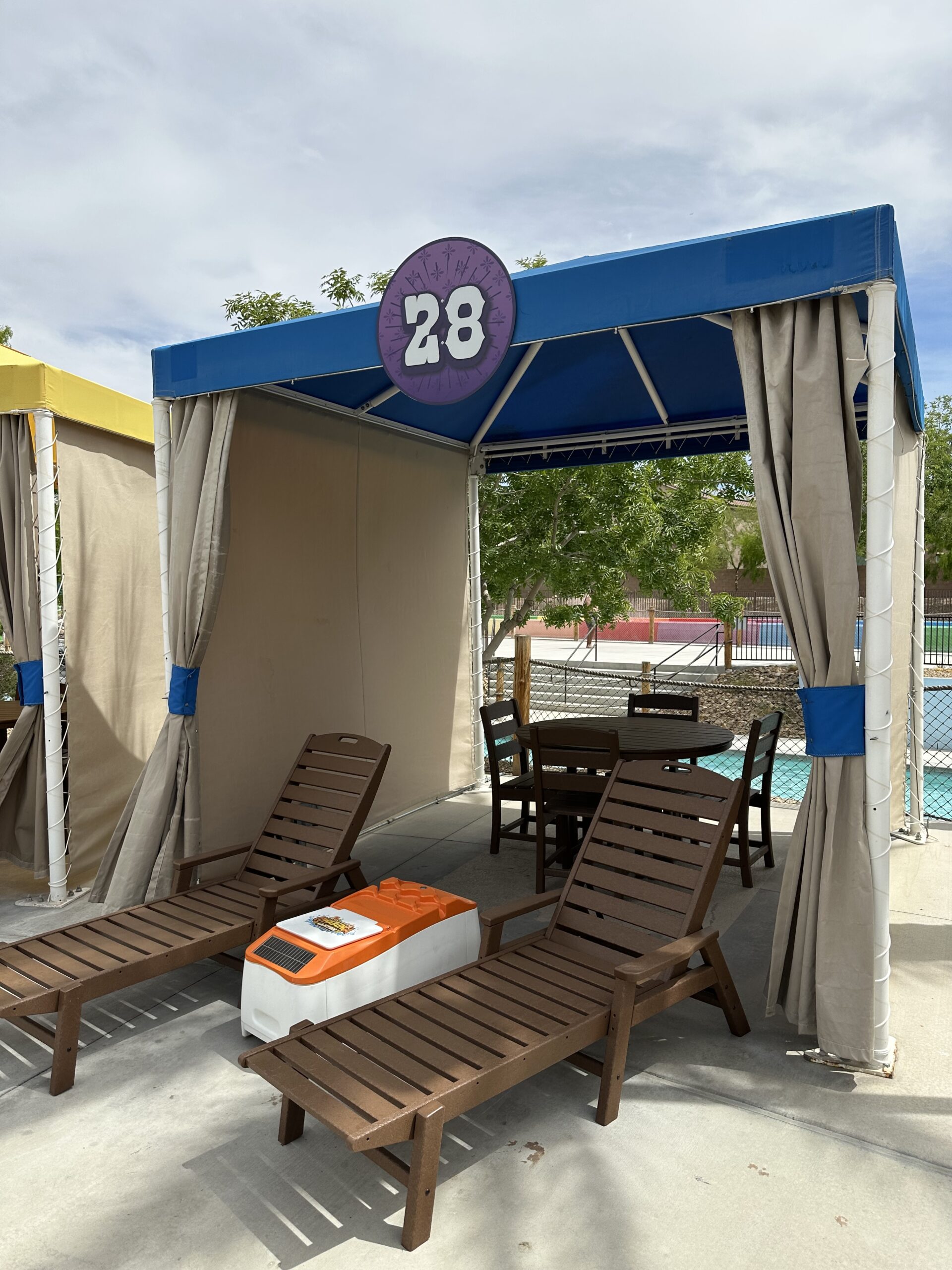 Water park cabana with LounGenie ice bucket and safe